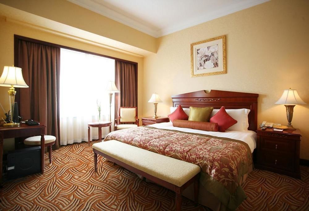 Holiday Inn Shanghai Nanjing Road By Ihg Exterior foto A bedroom at the hotel